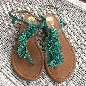 Dollymix brand size 9 aqua color buckle closure flat sandals.